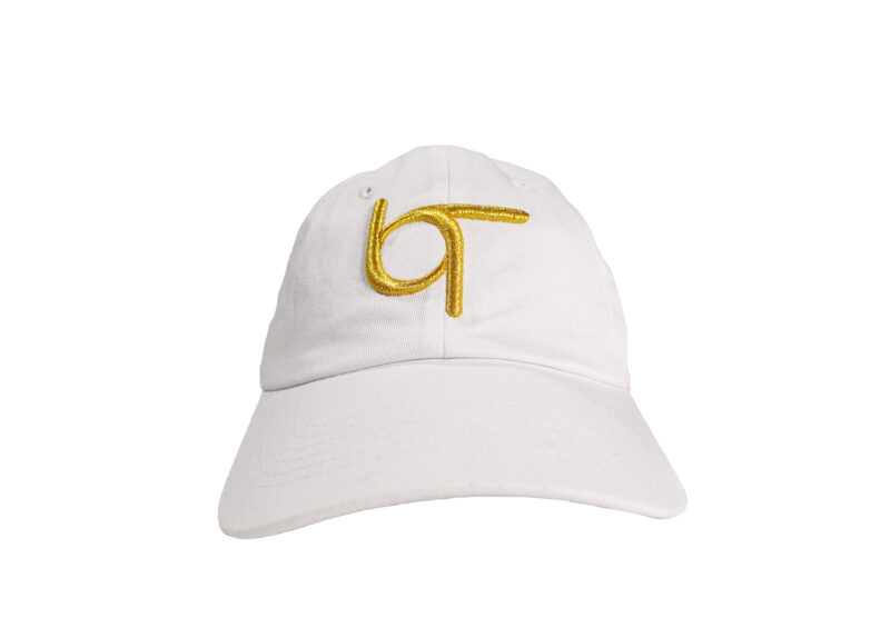 A white hat with the letter " b " on it.