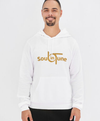 A man wearing a white hoodie with the word soul in tune.